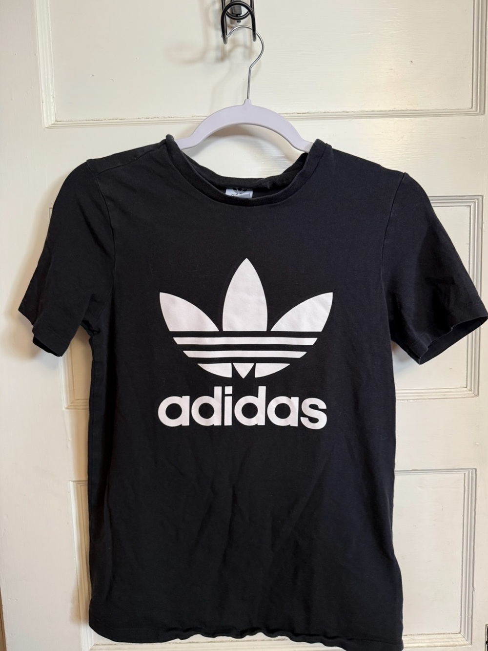Adidas black t-shirt with white logo, Doesn’t say a size I would say best for SM